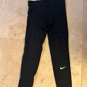 New with tags. Nike Pro Dri-fit Kids Black Leggings. Has 1 pocket.